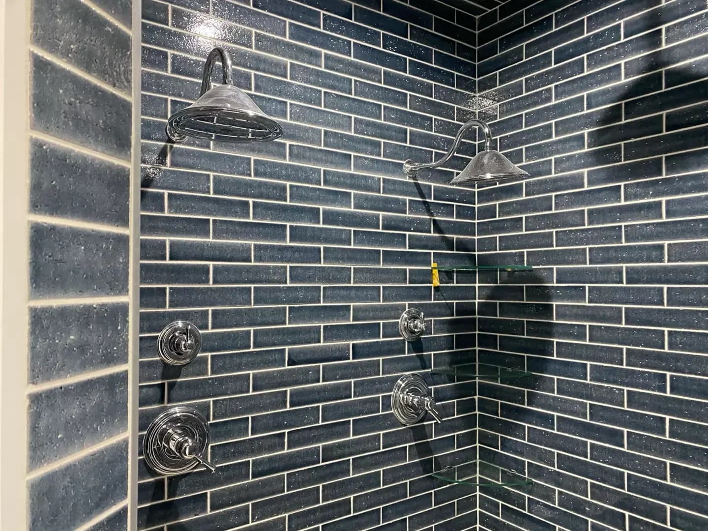 Addition blue subway tile shower in Vancleave, MS