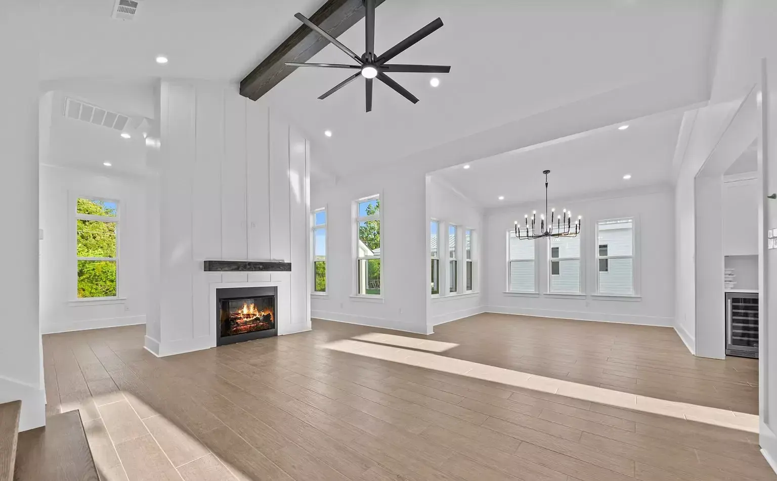 Living room beamed ceiling fireplace in Pass Christian, MS